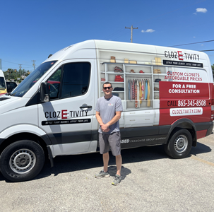 Clozetivity franchise owner standing in front of a branded Clozetivity van in Knoxville